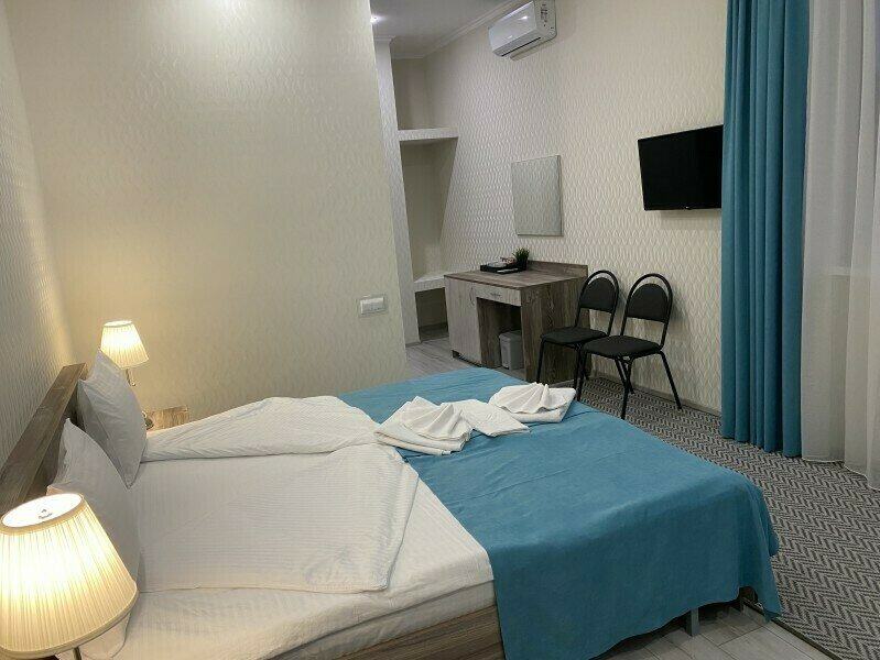 Улучшенный 2-местный (с кроватью King Size и с видом на город)