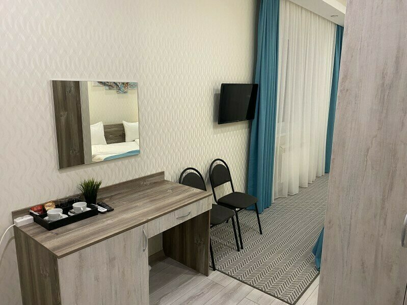 Улучшенный 2-местный (с кроватью King Size и с видом на город)