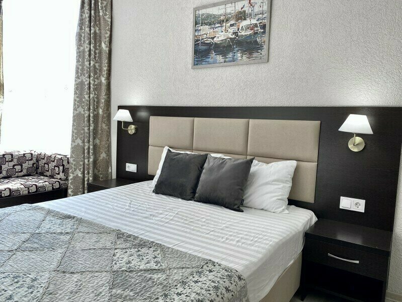 Комфорт Улучшенный 2-местный (с кроватью King Size и 2-мя доп. местами)