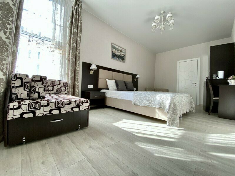 Комфорт Улучшенный 2-местный (с кроватью King Size и 2-мя доп. местами)