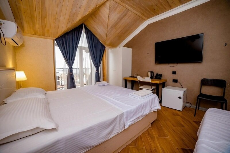 Deluxe 3-местный Tripl (мансарда с видом на море)