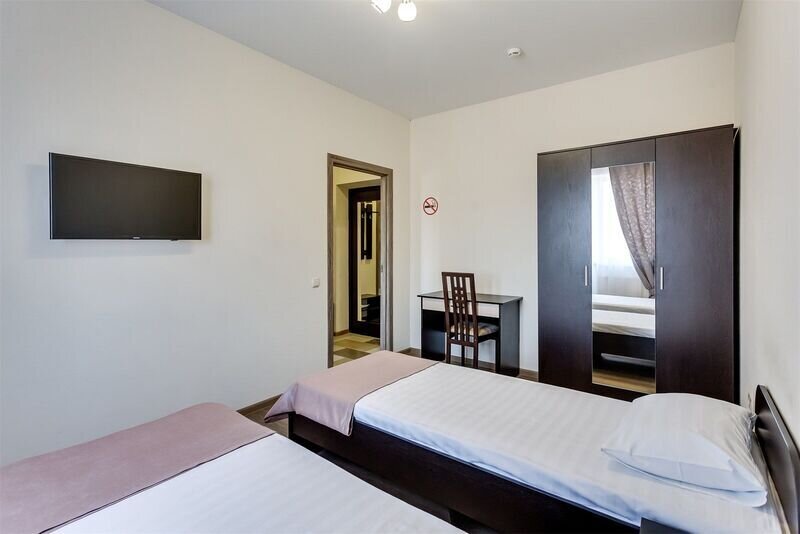 Делюкс 2-местный 2-комнатный (TWIN c балконом)