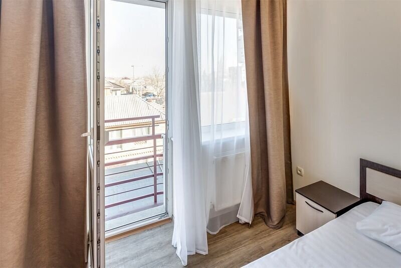 Делюкс 2-местный 2-комнатный (TWIN c балконом)