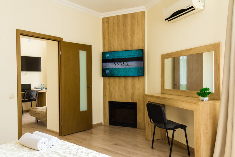 Люкс 3-местный 2-комнатный (с камином)