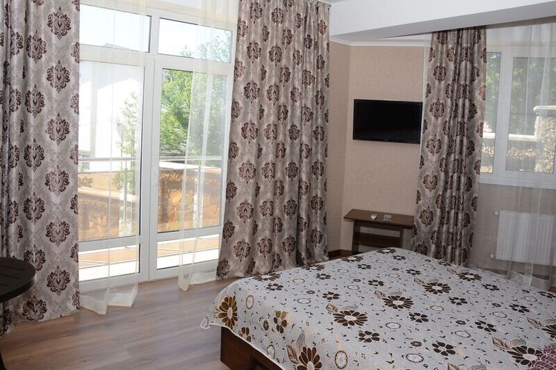 Апартаменты 4-местные Плюс (№9 с 1 спальней и балконом)