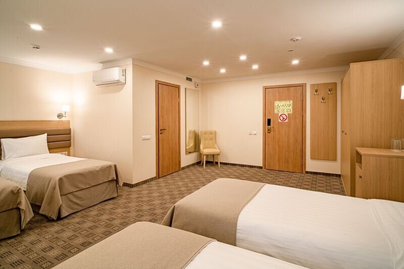 Стандартный 4-местный (односпальные кровати)