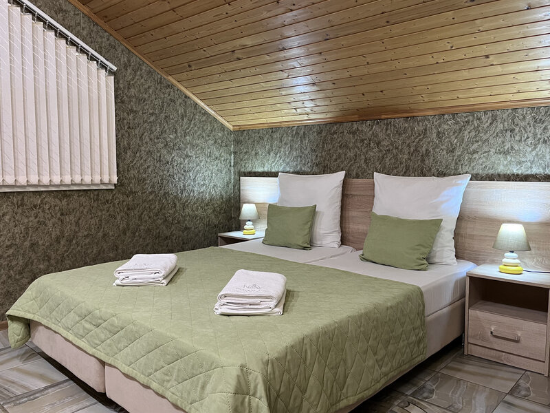 Апартаменты Премиум 11-местные (с 3 спальнями и балконом)