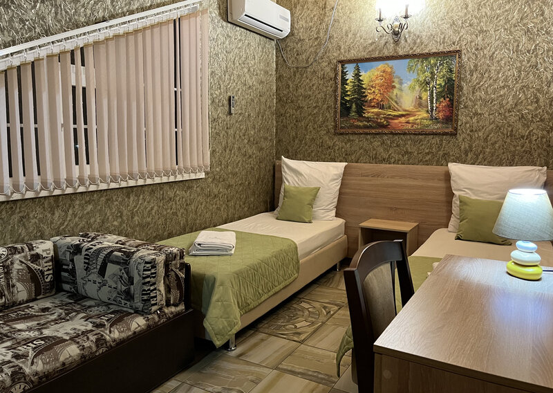 Апартаменты Премиум 11-местные (с 3 спальнями и балконом)