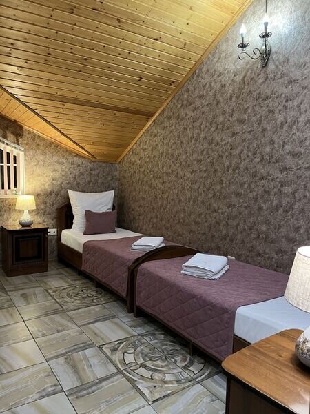 Апартаменты Премиум 11-местные (с 3 спальнями и балконом)