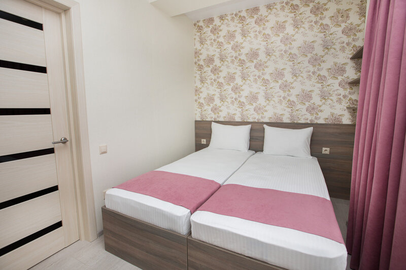 Апартаменты 4-местный Улучшенный (1 этаж)