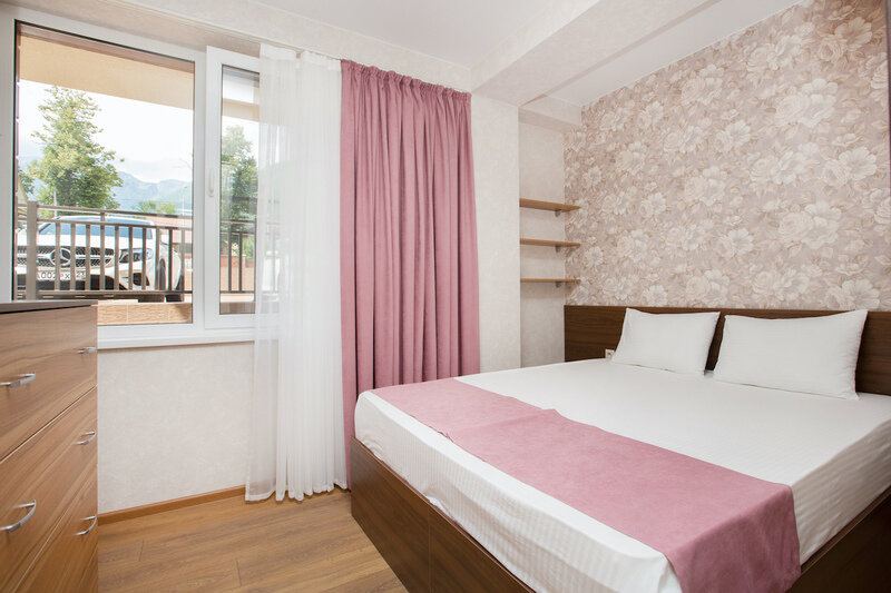 Апартаменты 4-местный Улучшенный (1 этаж)