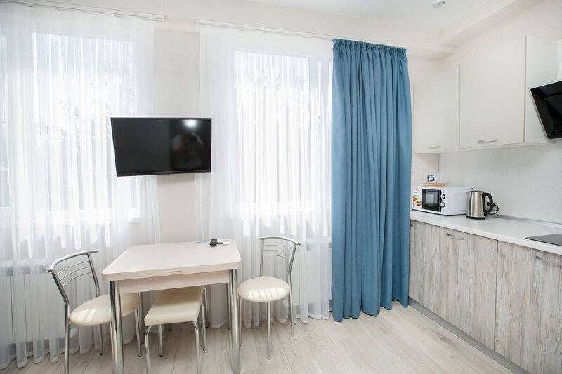 Апартаменты 4-местный Улучшенный (1 этаж)