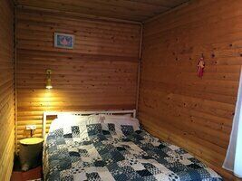 Двухместный номер с большой кроватью и общими удобствами, Гостевой дом Зайкина дача, Кончезеро