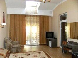 Двухместный люкс-апартаменты двуспальная кровать, Отель Маликон, Таганрог