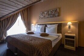 Семейный люкс с двумя спальнями и кухней, Отель Arkhyz Royal Resort & Spa, Архыз