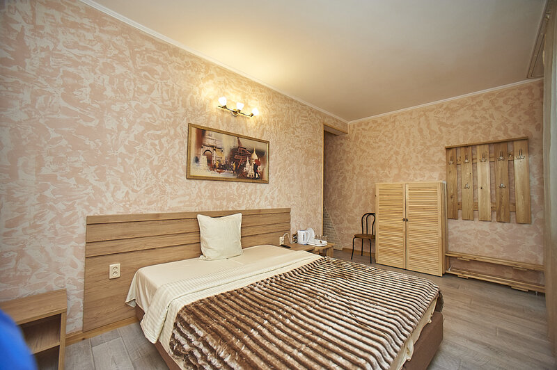 Люкс 4-местный 2-комнатный (№1, с видом на море, 1 этаж)