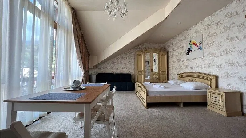 Улучшенный 4-местный 2-комнатный (DBL)