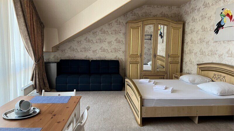 Улучшенный 4-местный 2-комнатный (DBL)