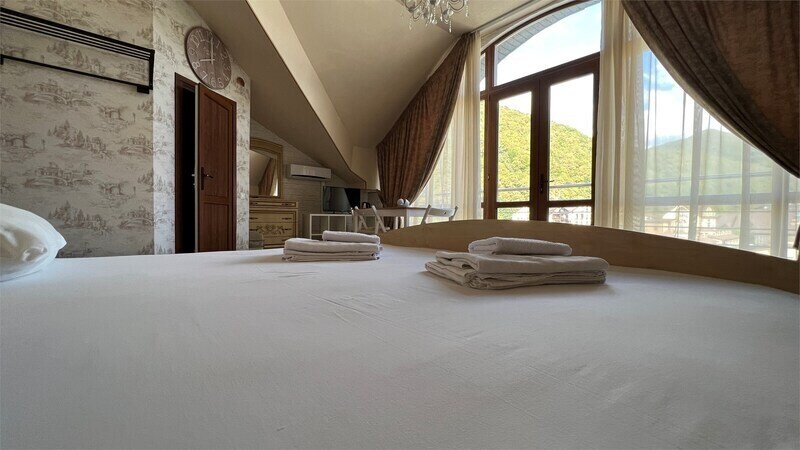 Улучшенный 4-местный 2-комнатный (DBL)