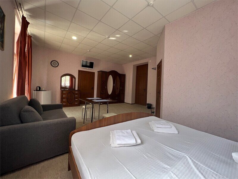 Улучшенный 4-местный 2-комнатный (DBL)