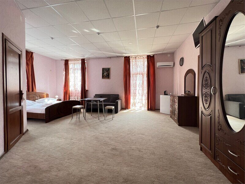 Улучшенный 4-местный 2-комнатный (DBL)