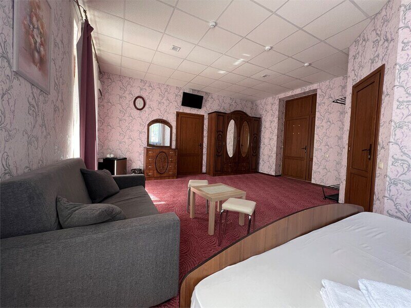 Улучшенный 4-местный 2-комнатный (DBL)