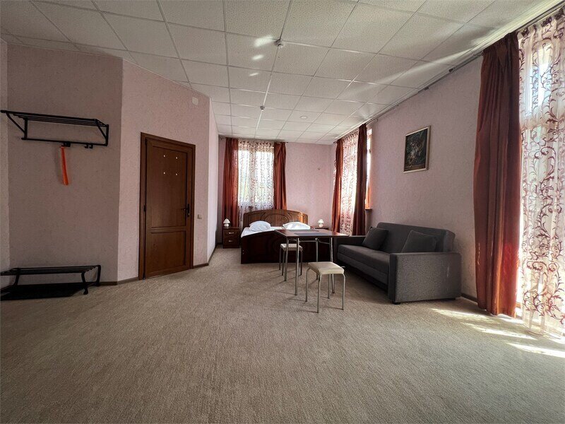 Улучшенный 4-местный 2-комнатный (DBL)