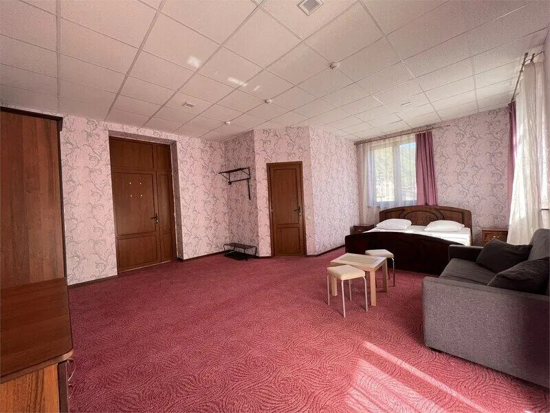 Улучшенный 4-местный 2-комнатный (DBL)