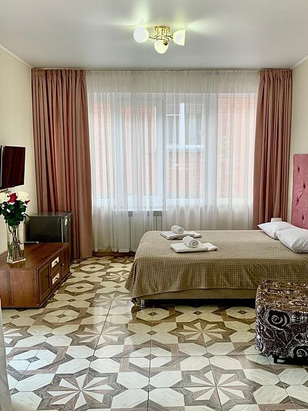 Люкс 4-местный 2-комнатный (с балконом)