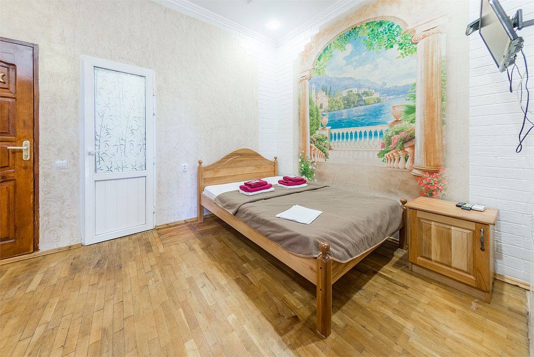 Апартаменты 4-местный 2-комнатный (с мини-кухней и балконом)