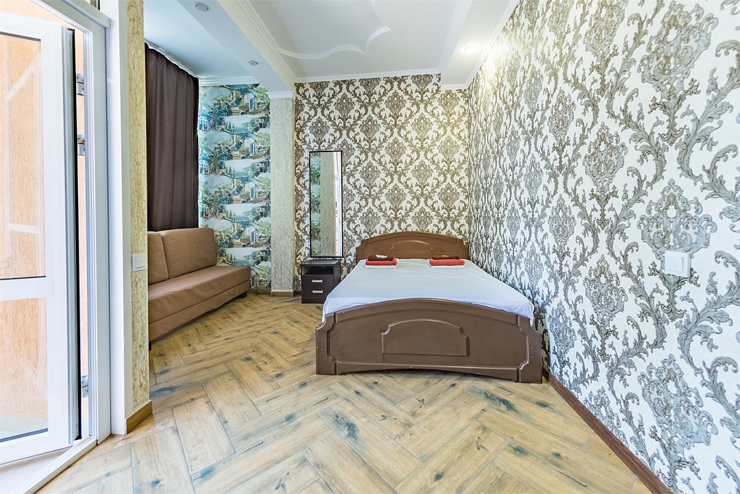 Апартаменты 4-местный 2-комнатный (с мини-кухней и балконом)