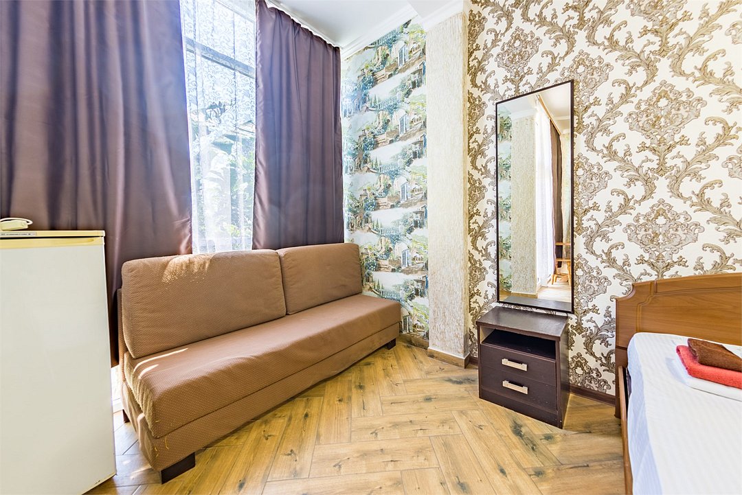 Апартаменты 4-местный 2-комнатный (с мини-кухней и балконом)