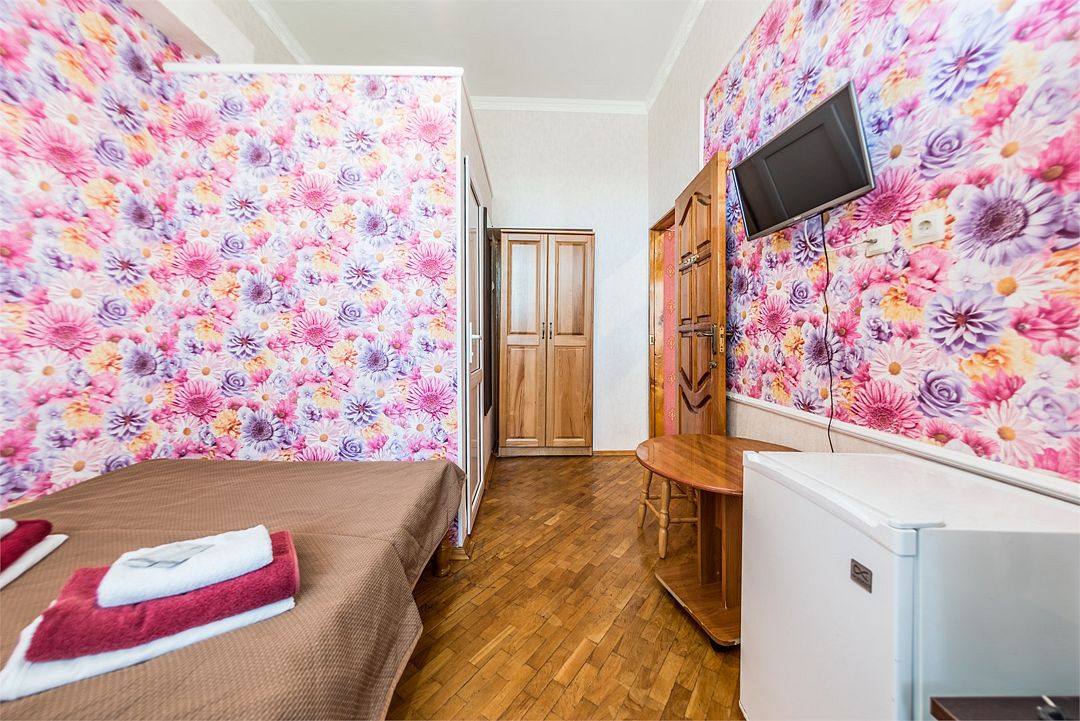 Апартаменты 4-местный 2-комнатный (с мини-кухней и балконом)