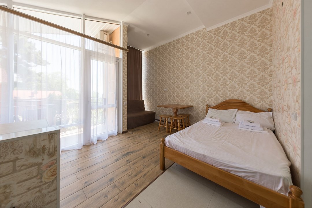 Апартаменты 4-местный 2-комнатный (с мини-кухней и балконом)