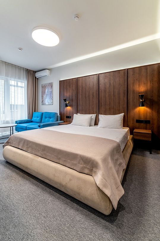 Делюкс 4-местный 1-комнатный (с балконом)