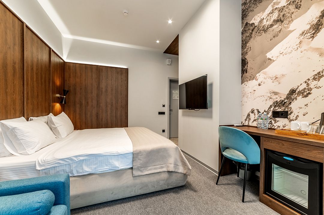 Делюкс 4-местный 1-комнатный (с балконом)