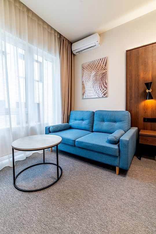 Делюкс 4-местный 1-комнатный (с балконом)