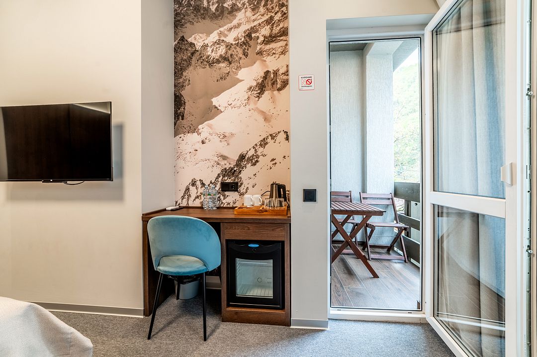 Делюкс 4-местный 1-комнатный (с балконом)