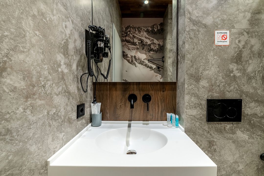 Делюкс 4-местный 1-комнатный (с балконом)