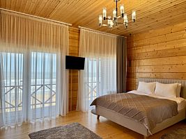 Семейный коттедж с балконом и с красивым видом из окна, Отель Sanitas Resort&SPA, Дербент