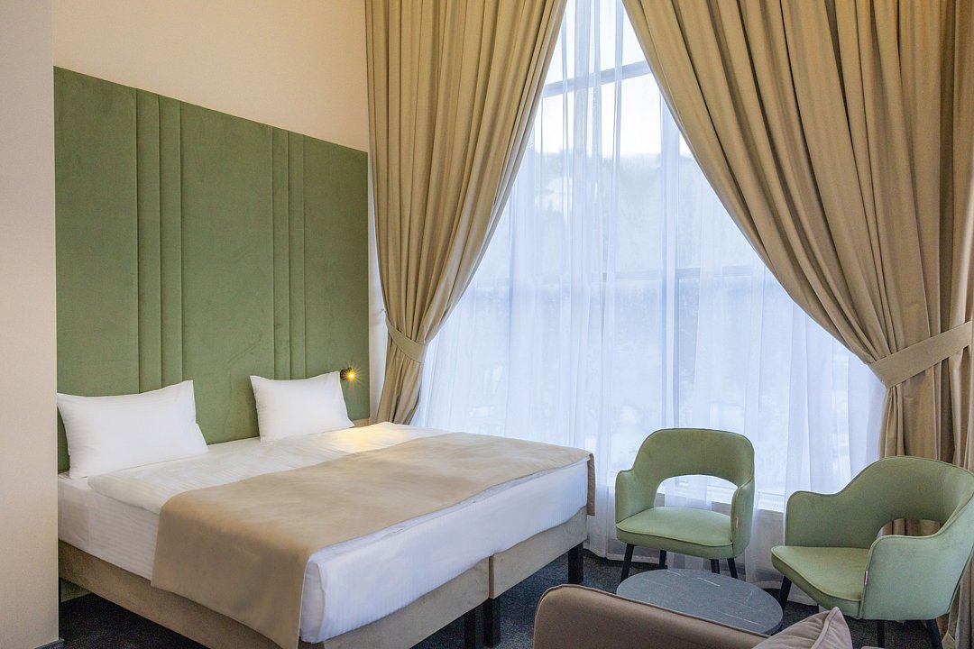 Люкс Аттик 2-местный 2-комнатный (мансардный, с террасой)