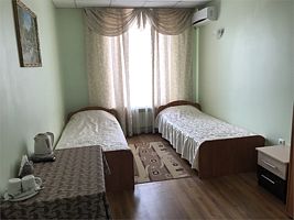 Двухместный номер с 2 односпальными кроватями и общей ванной комнатой, Отель Артик, Воронеж