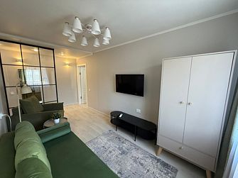 Апартаменты на Октябрьской площади 1