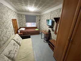 Номер стандарт с 1 односпальной кроватью и диван-кроватью. Общая ванная комната, Отель Basner Hotel, Ярославль
