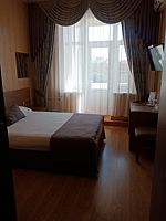 Двухместный номер Улучшенный с балконом и с видом на город двуспальная кровать, Отель Центральная, Тимашевск