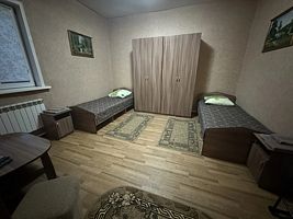 Кровать в общем номере с видом на внутренний двор, Отель Ангара, село Богучаны