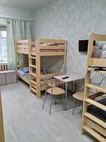 Кровать в общем номере с видом на город, Отель Гостиница Северяночка, Лоухи