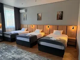 Кровать в общем номере (мужской номер) с видом на город, Отель Rioniros, Астрахань