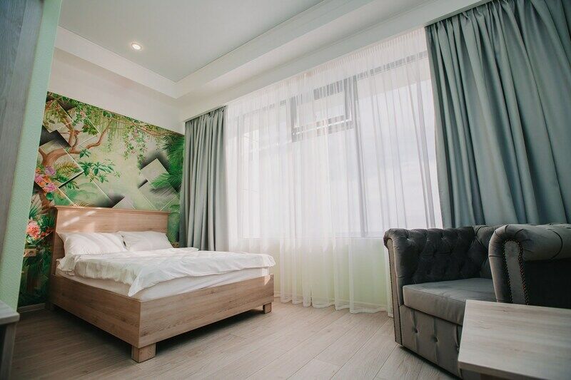 Делюкс 2-местный (частичный вид на море)